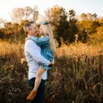 Parent using the Name It to Tame It technique to calm their child. Now the dad can hold her in peace.